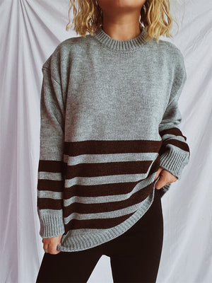 Horizontal stripe ribbed knit sweater in grey with dark brown stripes, crew neck, long sleeves.