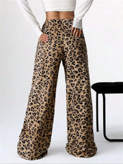 Leopard print lounge palazzo trousers with a bow detail, wide leg, and high waist.