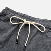 Relaxed culotte lounge shorts in charcoal grey with a drawstring waist and ribbed cuffs.
