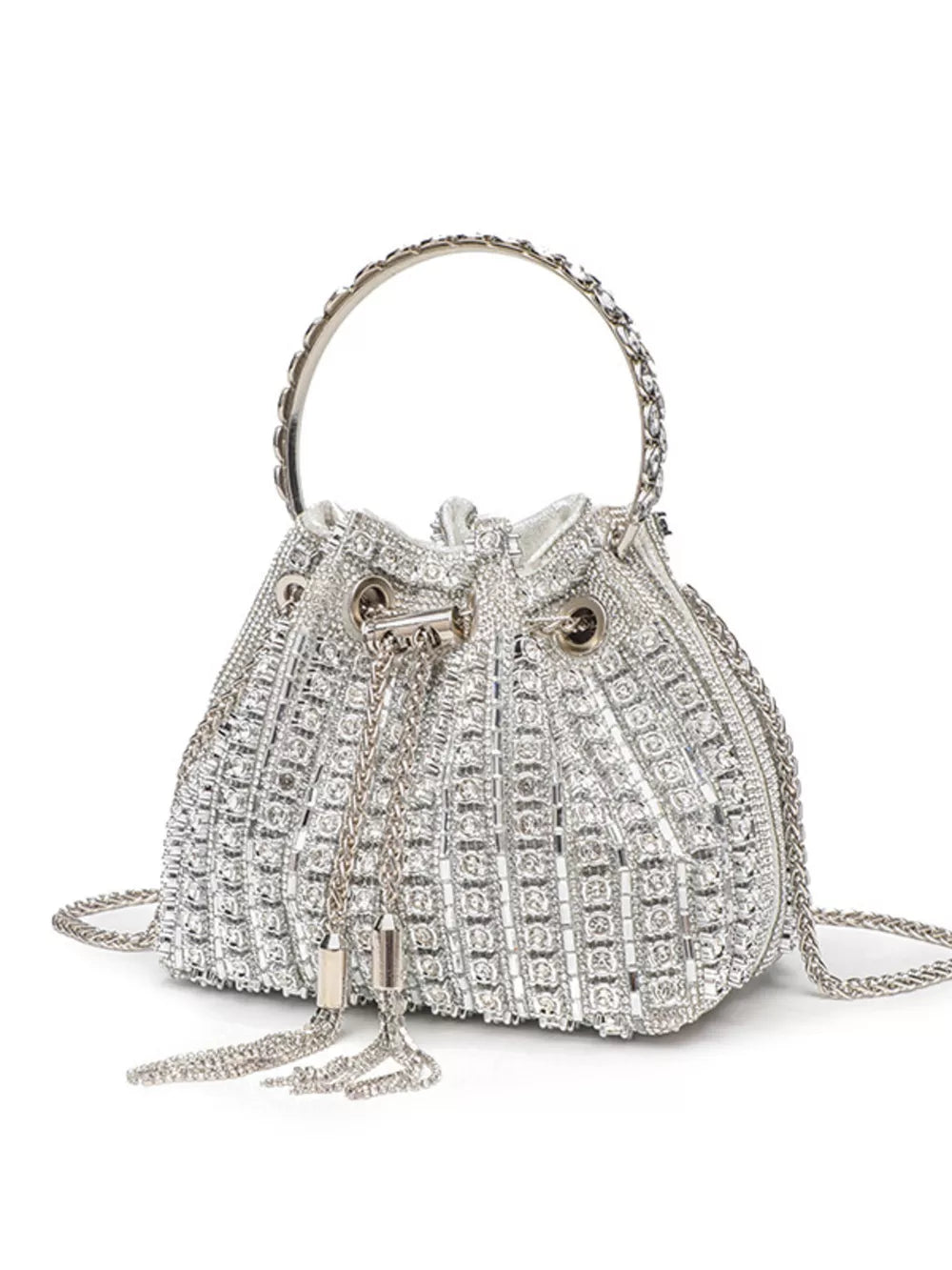 Silver rhinestone embellished mini bucket crossbody bag with chain strap and tassels.
