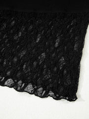 Black lace-trimmed asymmetric sheer shirt with scalloped hem detail.