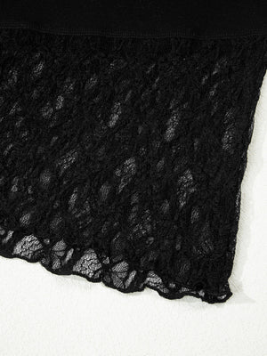 Black lace-trimmed asymmetric sheer shirt with scalloped hem detail.