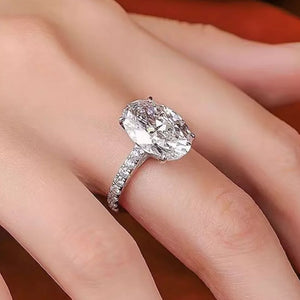 Elegant Moissanite Oval Ring in Sterling Silver with pave band