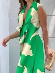 Green Flower tie-front maxi dress with abstract floral print, collared neckline, and sleeveless design.