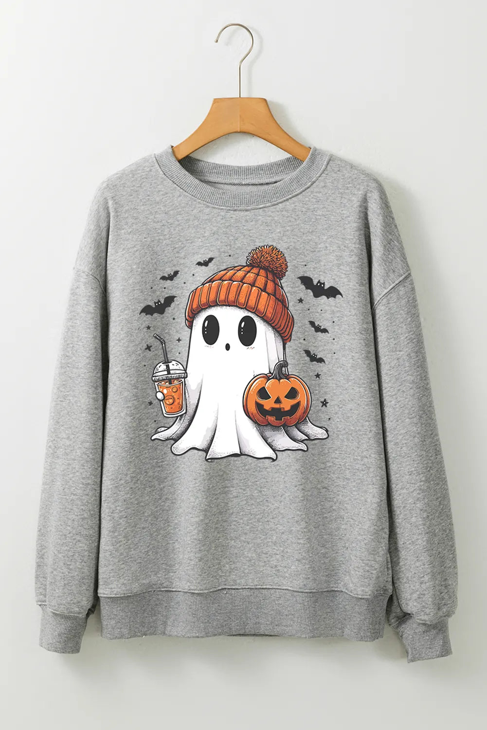 Gray crewneck sweatshirt with a cute ghost graphic holding a drink and pumpkin, with bats.
