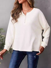 Ivory waffle knit henley shirt with button placket and side slits