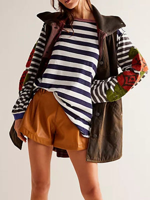 Striped long sleeve tee with embroidered floral detail on sleeves.