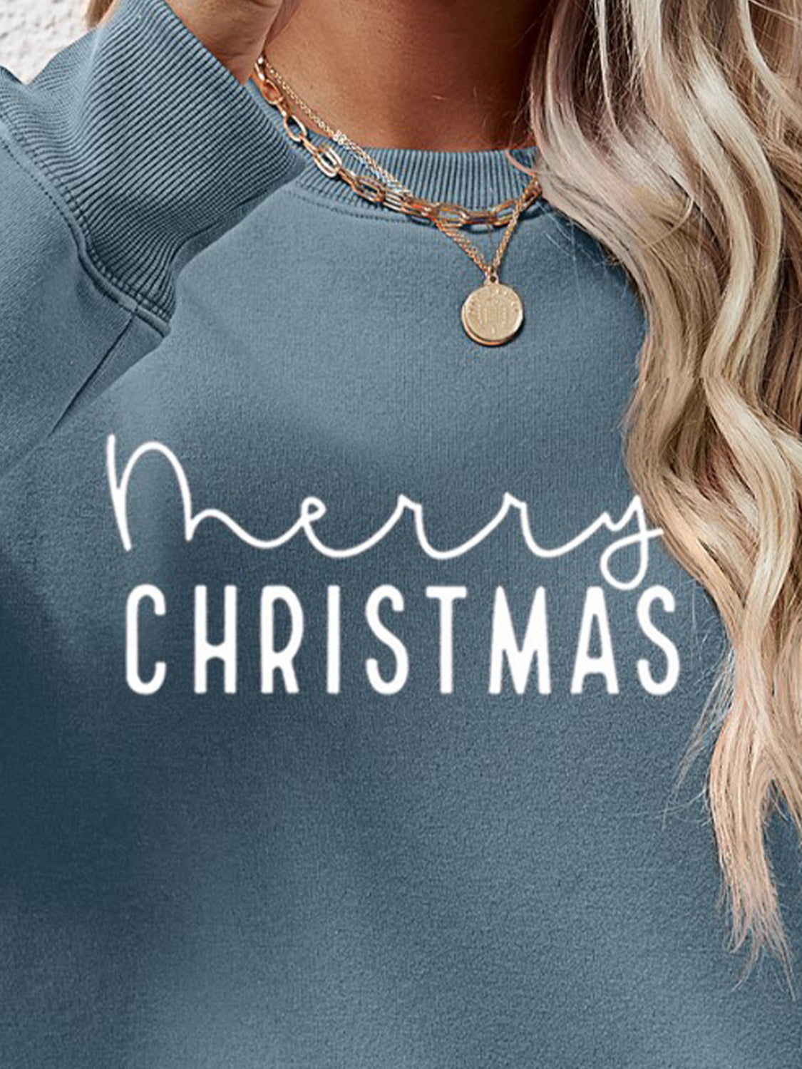 Misty Blue Merry Christmas graphic sweatshirt with crewneck.