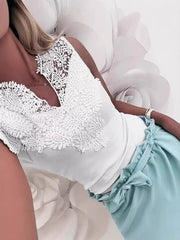White lace-embellished notched V-neck tank top with intricate floral lace detail on neckline.