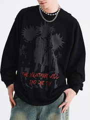 Black oversized long sleeve t-shirt with graphic print and red text.