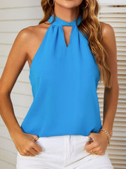 Sky blue halterneck top with keyhole cutout and tie-back detail.