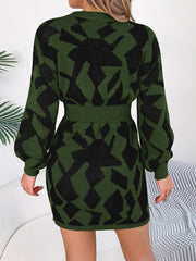 Army green knit mini dress with black geometric pattern, long sleeves, and belted waist.