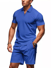Royal blue textured polo shirt and shorts ensemble for men.