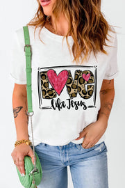 White graphic tee with leopard print "LOVE" and pink heart, "like Jesus" text.