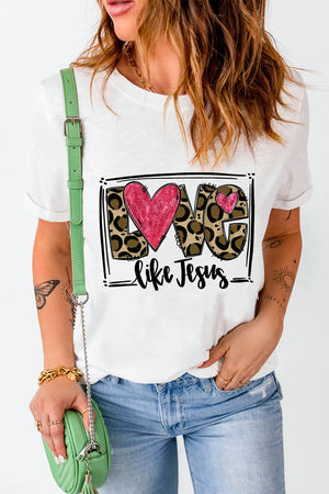 White graphic tee with leopard print "LOVE" and pink heart, "like Jesus" text.