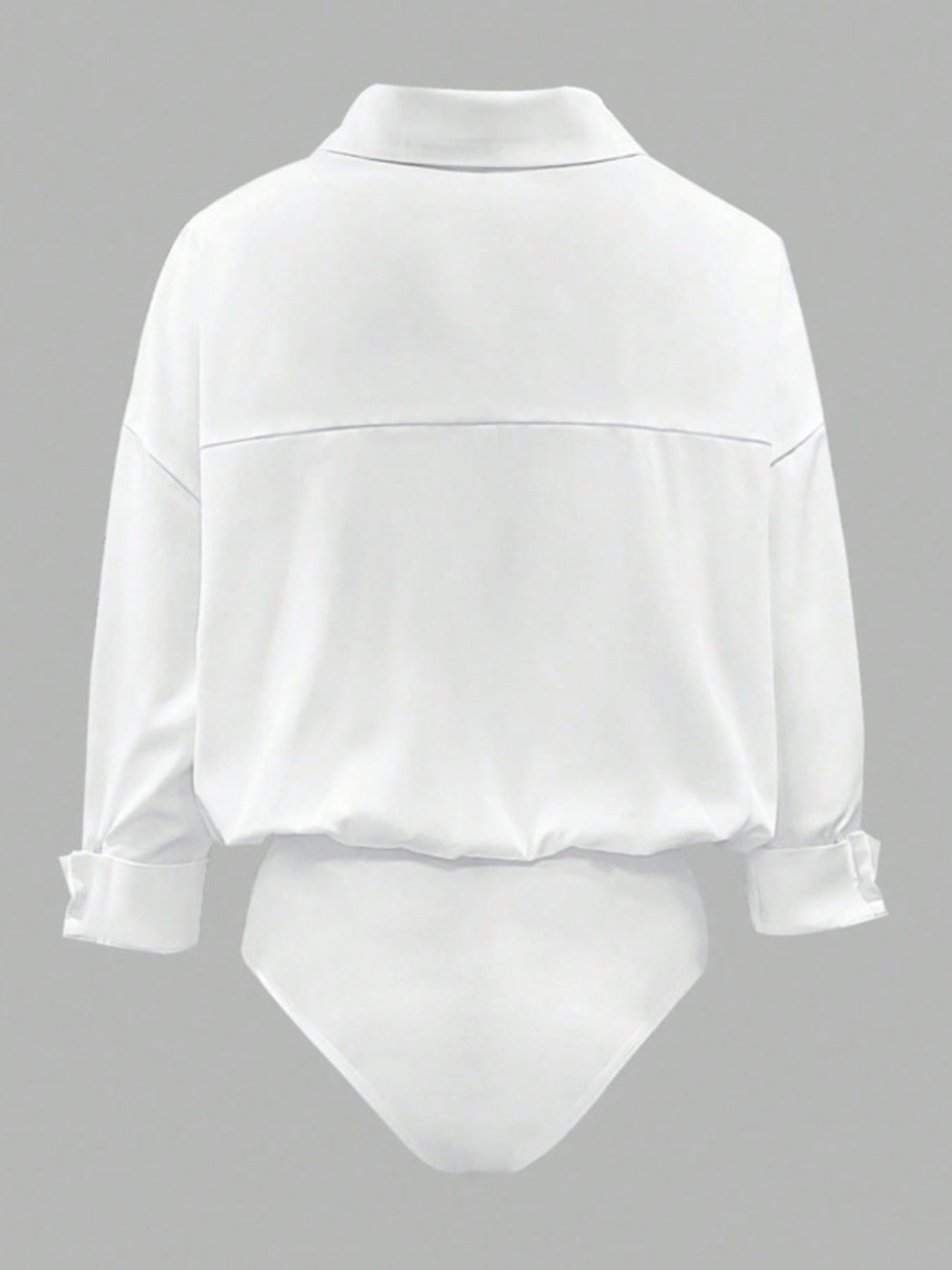 White collared long sleeve bodysuit with button cuffs and a cinched waist detail.
