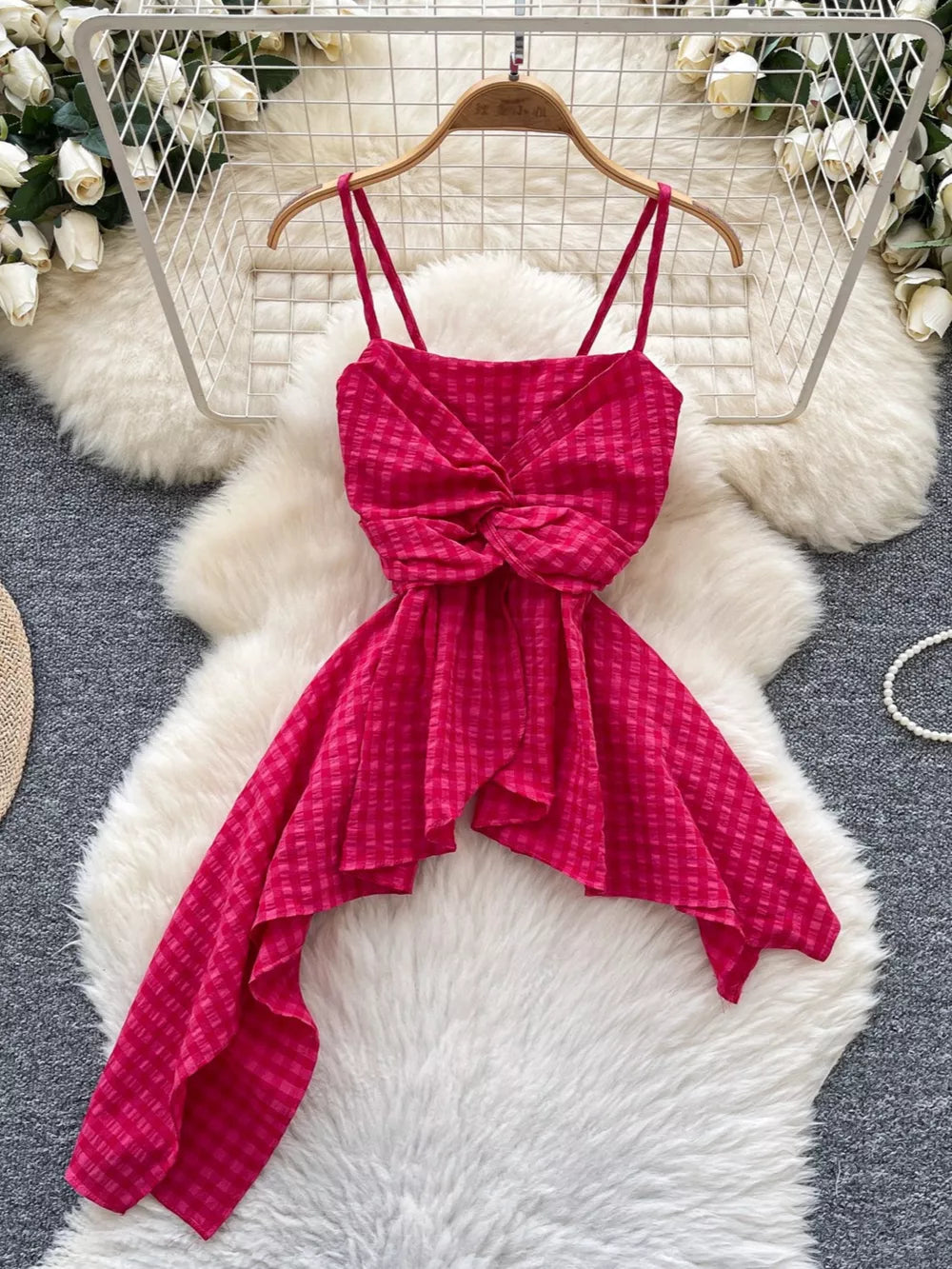Rose red asymmetrical cami top with twisted knot detail and plaid pattern