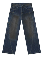 Faded panel wide-leg denim jeans in medium wash with a relaxed fit.