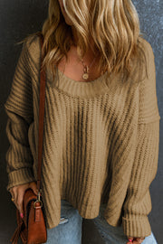 Camel acrylic chunky ribbed knit sweater with wide neckline.