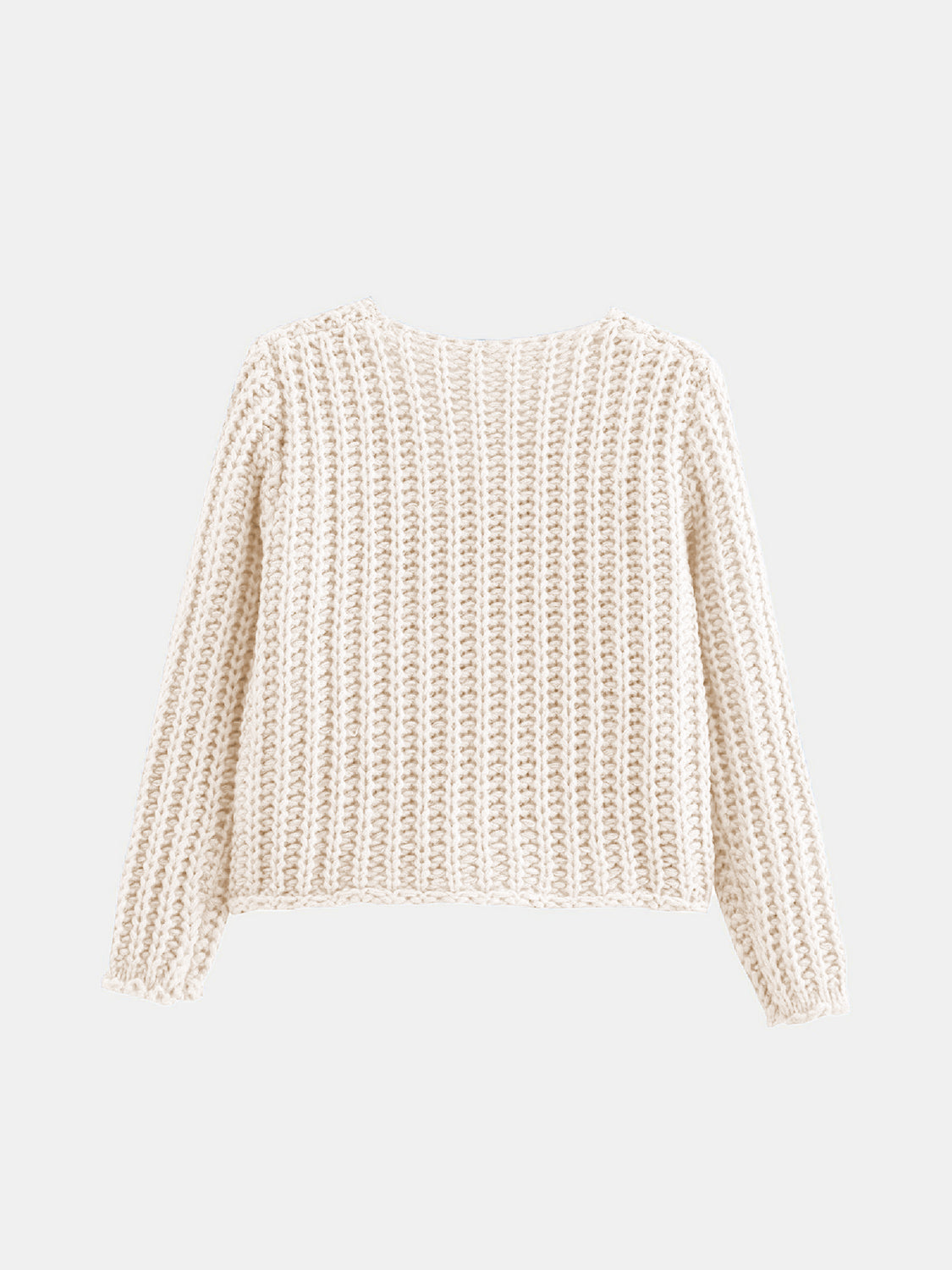 Beige chunky knit cardigan with ribbed texture and long sleeves.