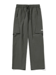 Gray cargo pants with zip-off legs and drawstring waist.