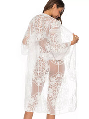 White floral lace kimono cover-up with bell sleeves and intricate embroidery.