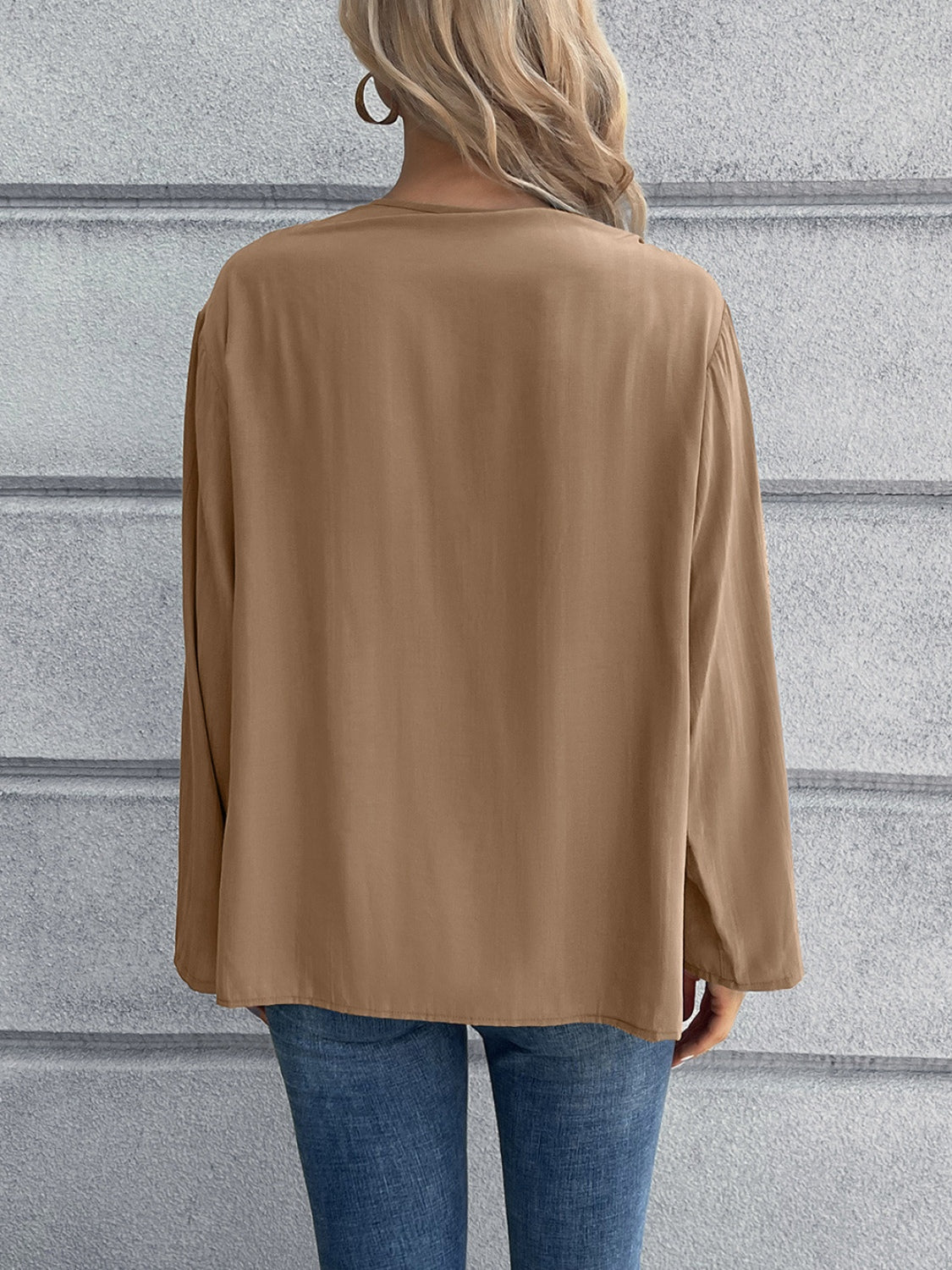 Camel long sleeve button-down blouse with mandarin collar, shown from the back.