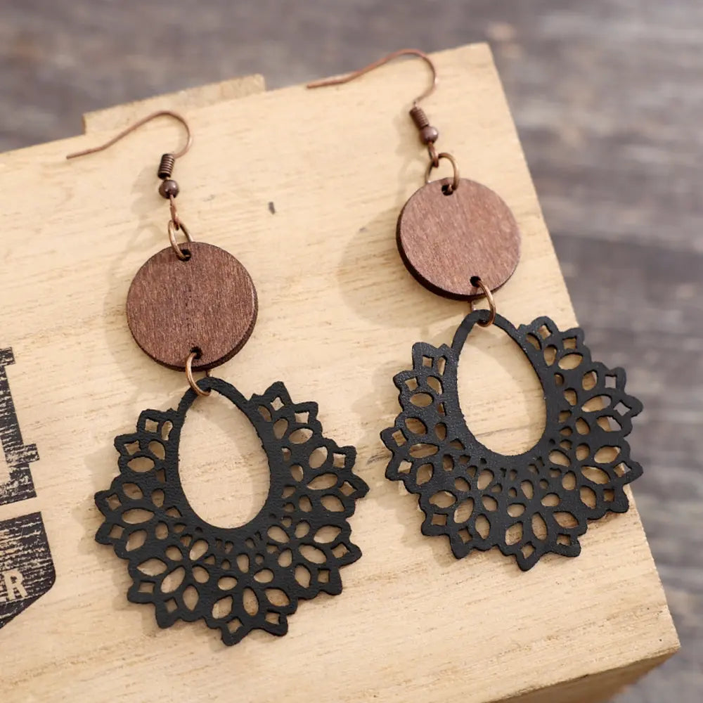 Black floral laser-cut wooden drop earrings with round wood accents