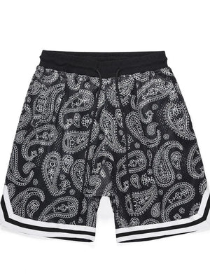 Paisley mesh basketball shorts in black with white trim and drawstring waist.