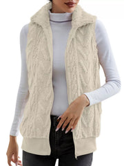 Off-white faux fur zip-up vest with textured pattern and collared neckline.