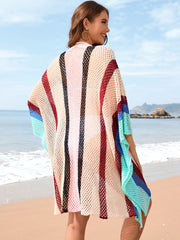 Striped mesh kimono cover-up with open knit and colorful vertical stripes.