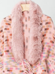 Pink textured plaid acrylic poncho with faux fur collar and fringe detail.