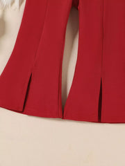 Wine red flare pants with side slits and ruffled trim detail