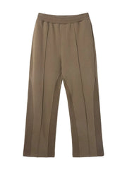 Taupe lounge trousers with vertical seam details and a relaxed fit.