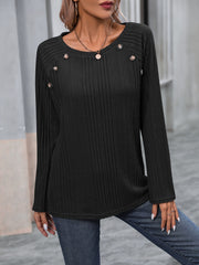 Black ribbed knit raglan sweater with button trim detail on the shoulder.