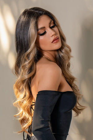 Ombre wave synthetic lace front wig in brown/caramel balayage with loose curls.