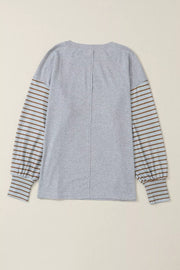 Maternity shirt in gray with striped bishop sleeves in blue and brown, crew neck