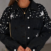 Black denim jacket with pearl and star embellishments