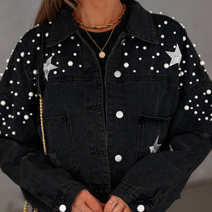Black denim jacket with pearl and star embellishments