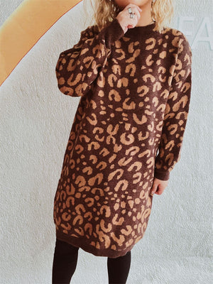 Leopard knit mini dress in caramel with long sleeves and a mock neck.