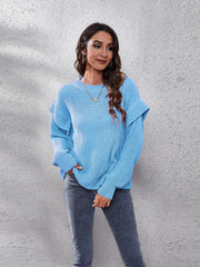 Pastel blue ribbed knit pullover sweater with ruffled sleeves and crew neck.
