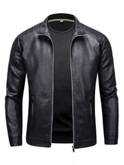Black zip-up long-sleeve faux leather jacket with quilted shoulder details and zippered pockets.