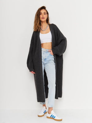 Oversized charcoal gray ribbed knit maxi cardigan with balloon sleeves and an open front.