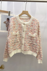 Textured bouclé knit cardigan in pastel multi-color with jewel buttons and patch pockets.