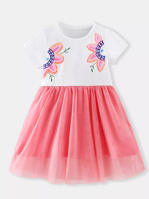 White cotton dress with floral embroidery and pink tulle skirt