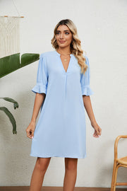 Sky blue V-neck shift dress with flutter sleeves and a relaxed fit.