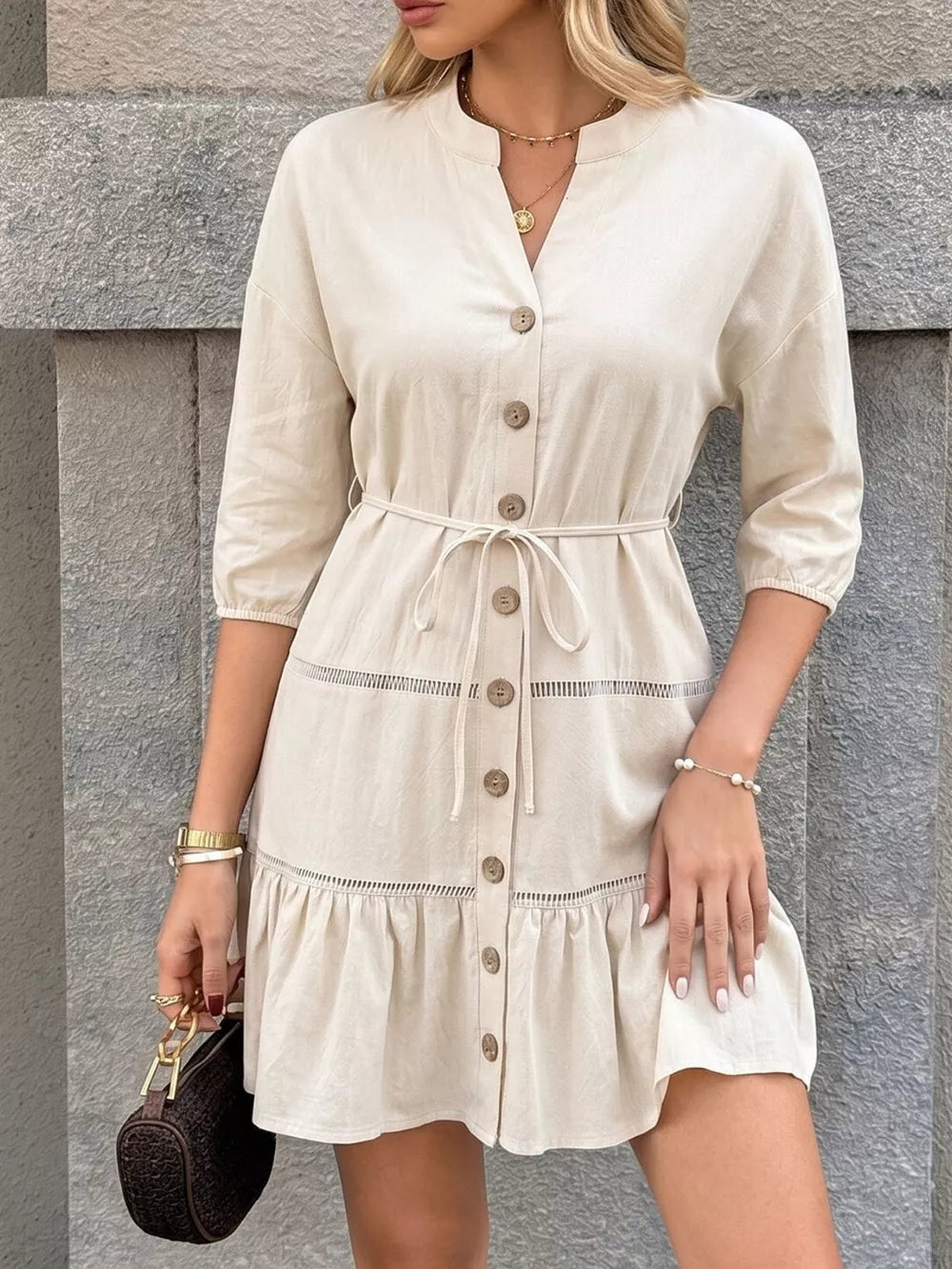 Apricot cotton V-neck button-down mini dress with tie waist and ruffle hem