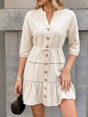 Apricot cotton V-neck button-down mini dress with tie waist and ruffle hem