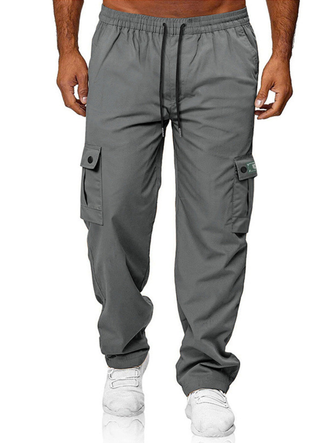 Gray cargo pants with adjustable drawstring waist and button flap pockets.