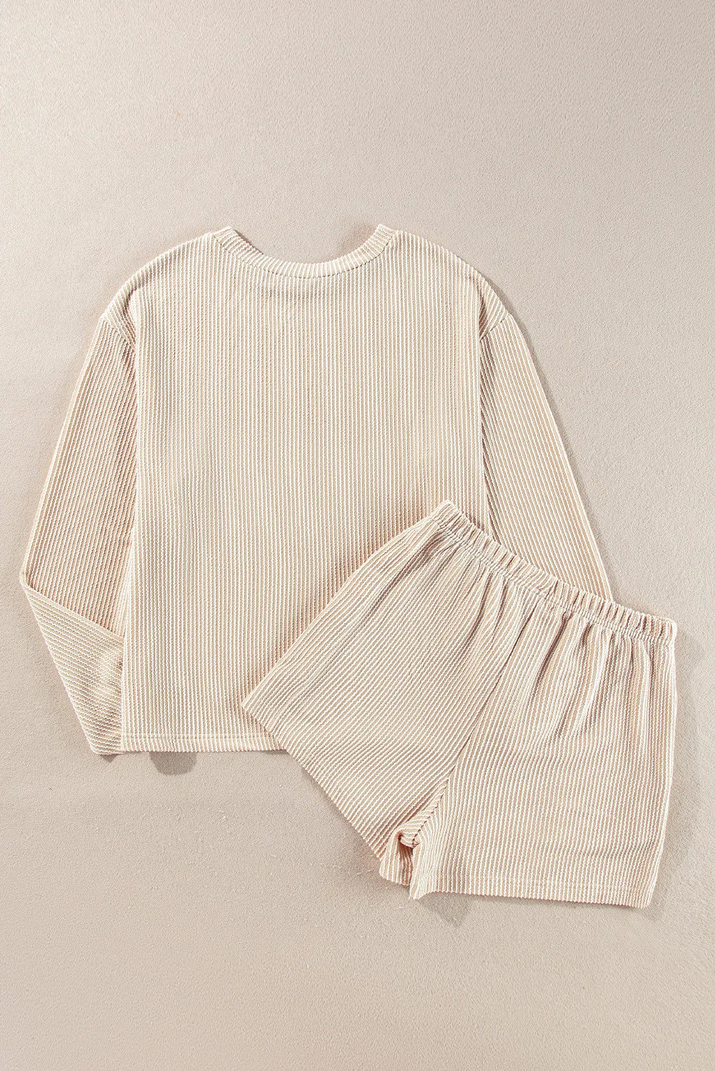 Chic monochrome matching set with long sleeve top and shorts in Dust Storm color.